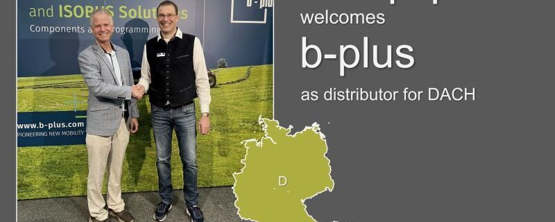 Norman and Harald shaking hands to confirm b-plus as Senquip distributor in DACH region.